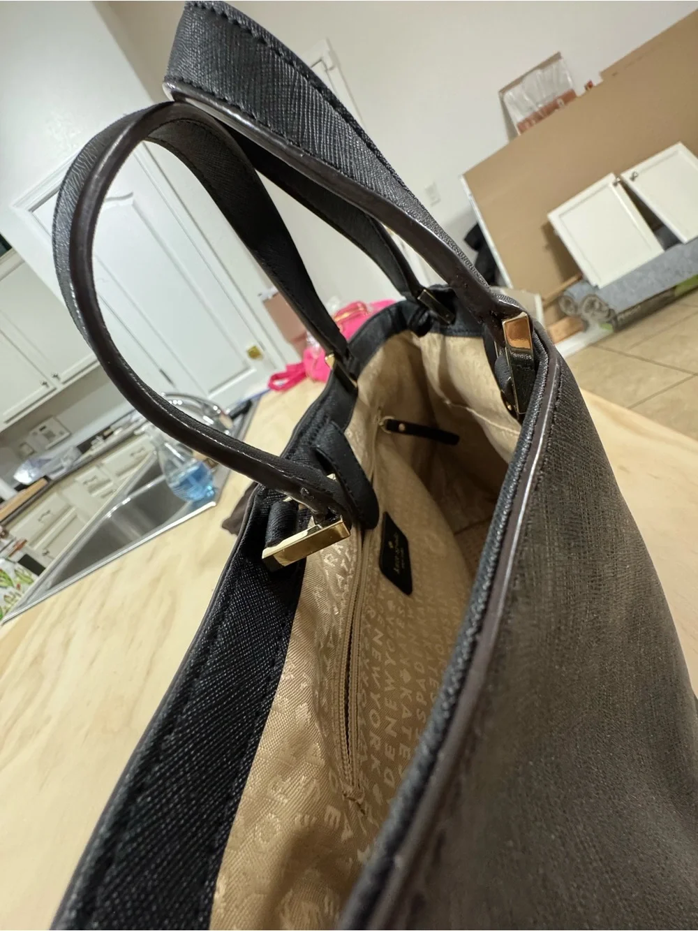 kate spade black saffiano tote with gold accents